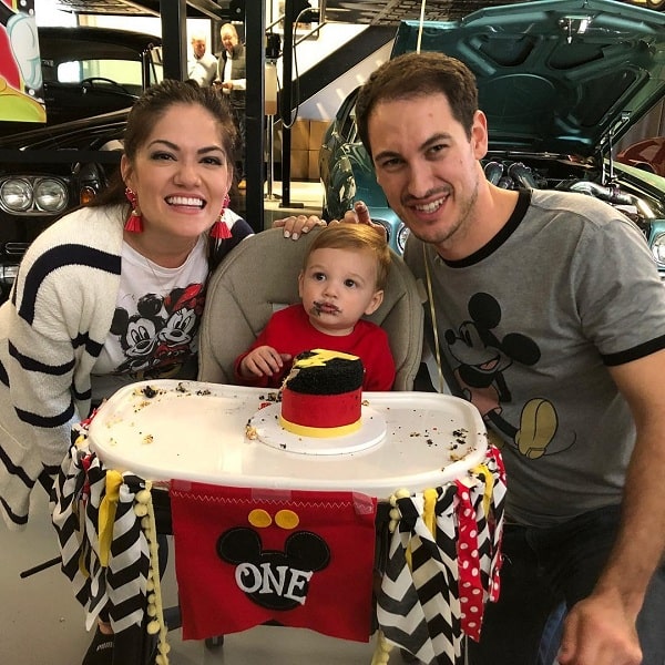 A picture of Joey Logano and his wife, Brittany Baca celebrating their son's 1st birthday.